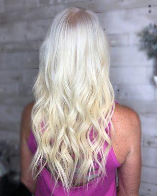 Platinum blonde with full head of 18" remy tape in extensions