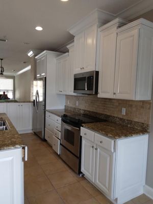 kitchen job customer did not want to replace cabinets so we made them pretty again