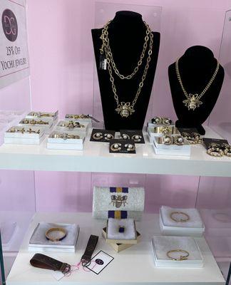 Gorgeous display featuring bees on gold tone jewelry by Yochi