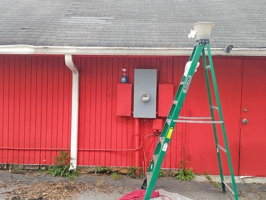 Gutters being cleaned