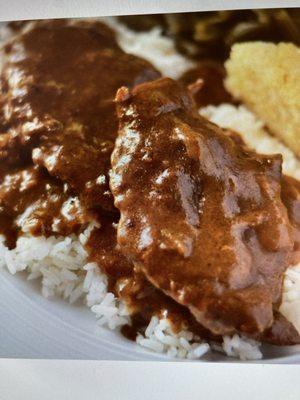 Stew beef tips and gravy with rice