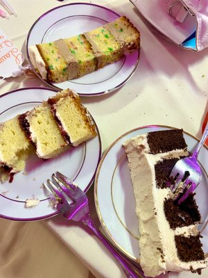 Funfetti cake with Chocolate Buttercream, Yellow cake with raspberry Preserves and Chocolate cake with chocolate Buttercream slices.