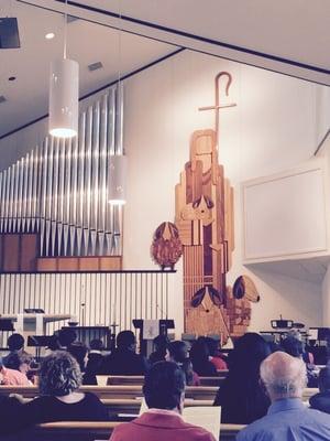 What a beautiful stage / podium, and note the pipes for a pipe organ.