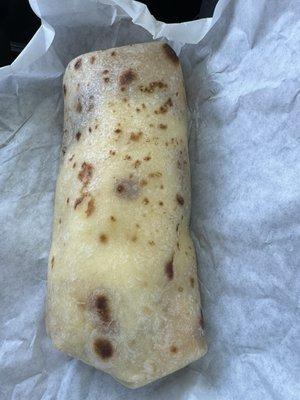 Rice, beans, cheese, and sour cream burrito