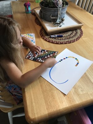 Tracing initials with stickers