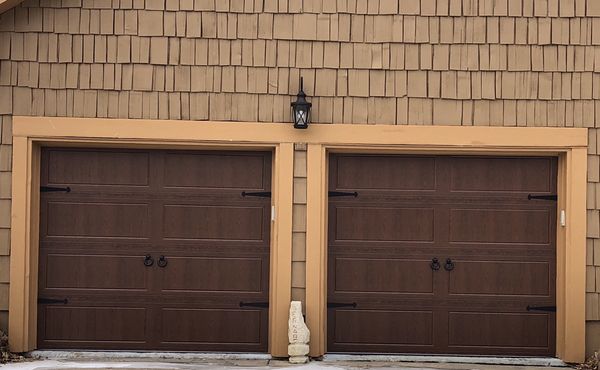 Insulated garage doors with Walnut finish