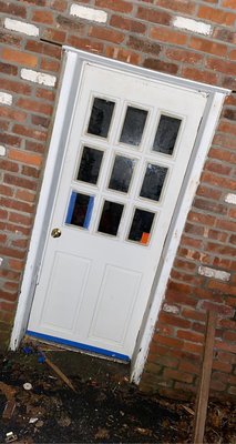 After photo of door replaced, custom cut and installed by Danny