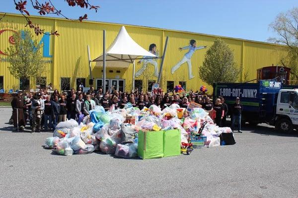 1-800-GOT-JUNK? and Second Chance Toys collect toys at the Delaware Museum