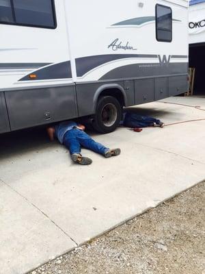 Tyson and another employee helping us get our RV back on the road!