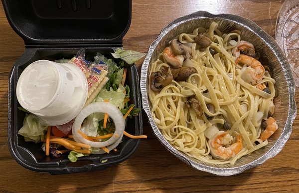 Shrimp scampi with salad