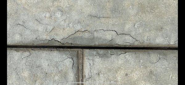 Cracks in tan patio