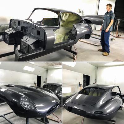 One of our paint and body technicians finishing at Gunmetal Grey paint job on an E-Type