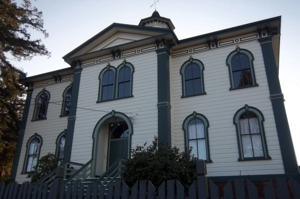 The building behind the church.