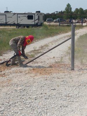 Sandblasting a fence