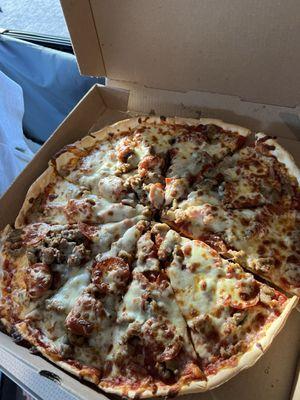 Large sausage and pepperoni pizza