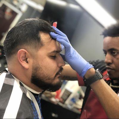 Mid fade with beard line up