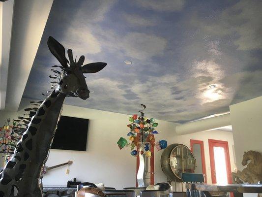 This is the ceiling living room mural that was based out by Terry Hunt Painting and Decorating, so I could hand paint all the various clouds