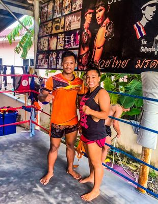 Trainer and owner, Daisy with her trainer Jaiphet in Thailand at Sitjaopho.