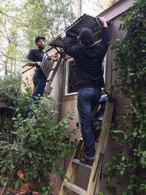 Tim & Grant from Old Chico Iron, installing another awning on our house!