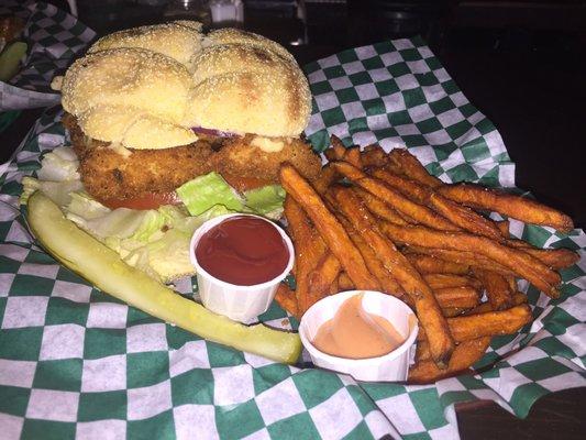 Alaskan Cod sandwich with house-made tartar and sweet potato fries