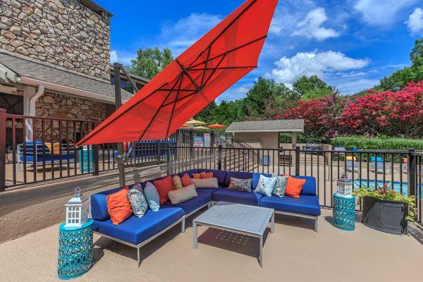 Pool Deck with lounge sofa and umbrella