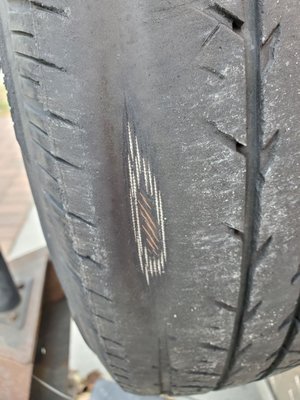 Steel belt showing threw tire