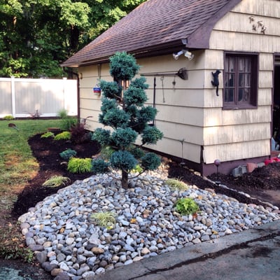 Planting and design with new river rock and mulched beds in Pompton Lakes NJ