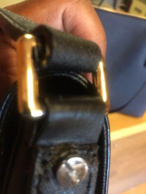 Michael Kors little strap work replacement. This is a very poor quality of work.