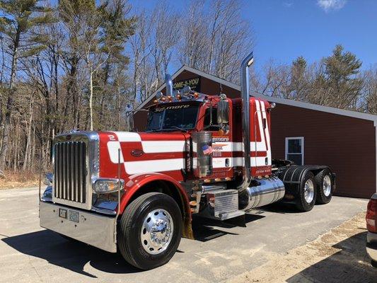 Complete aluminum polishing and paint correction on this tractor.