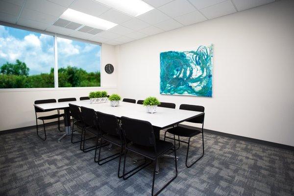 Our spacous "Conference" Room has large windows. It's perfect for team meetings, trainings, networking and community events.