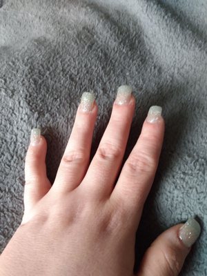 Full set of acrylics with silver sparkle gel polish