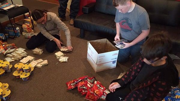 Students packing items to send to our troops in Kuwait, Qatar, and Afghanistan.