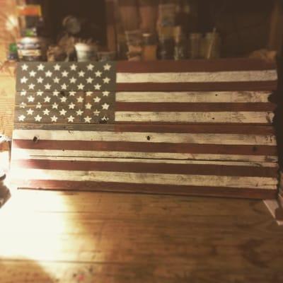 The Red Barn Reclaimed Wood American flag using old fence boards to create!