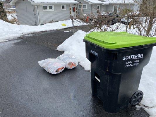 Garbage left and down power line from truck