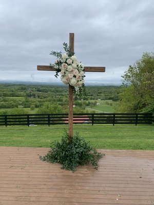 Wooden wedding cross set up for ceremony at Trinity View Farms