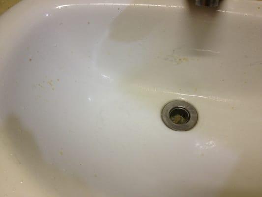 Clogged and goop-sprayed sink.