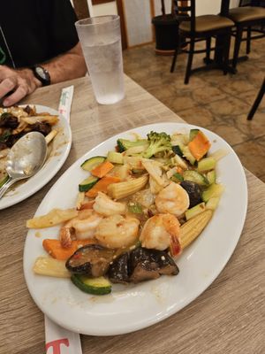 Big platter of fresh huge shrimp and veggies.