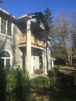 Removed and replaced rotted 17-foot columns and re-built upper balcony fence.