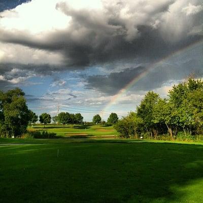 View from the tee box with a rainbow hitting the pin!