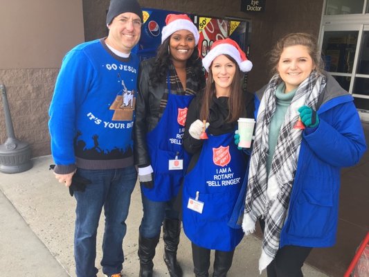 Our team ringing the bell for Salvation Army.