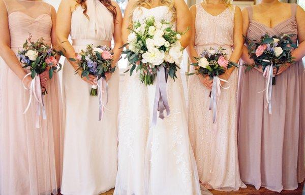 shot of bridal and bridesmaids boquets (the loops, ugh, the loops // ref my review)