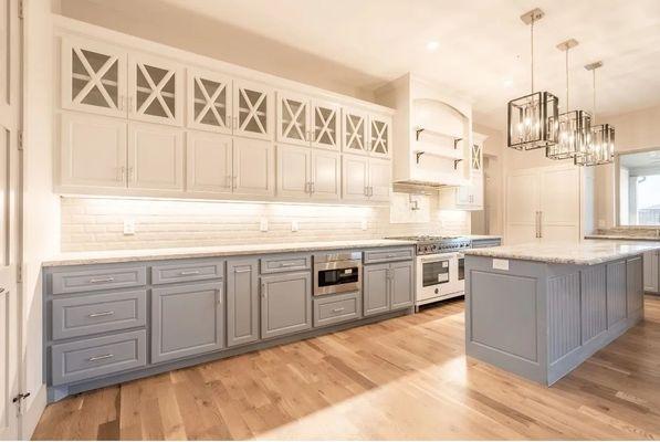 Two tone color palette on new custom cabinets.