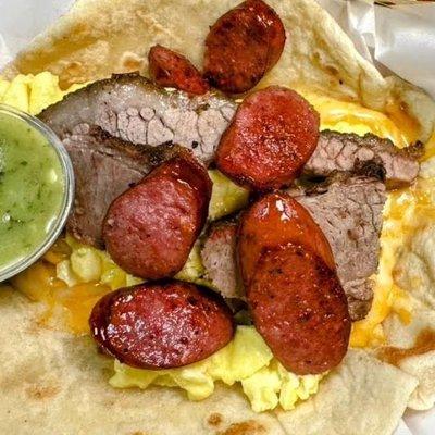 Brisket sausage egg cheese taco