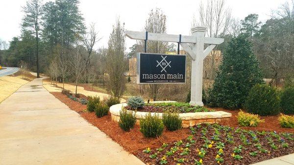 Neighborhood community entrance signage, Hand applied pure silver leaf box, chrome lettering. Painted cedar compliments the landscape nicely