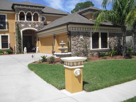 We added Natural Stone and trim to the exterior of this home. Also added 2 columns on opposite sides of the driveway.