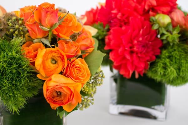 Bright spray roses and dahlias.