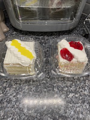 Lemon and strawberry cakes packaged to go.