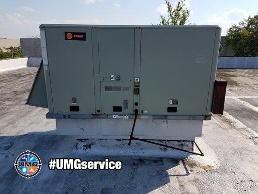 Servicing A Commercial Air Conditioning Unit In Teterboro New Jersey