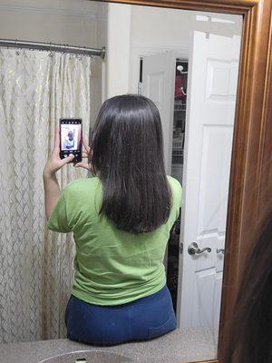 Back pic of uneven hair cut