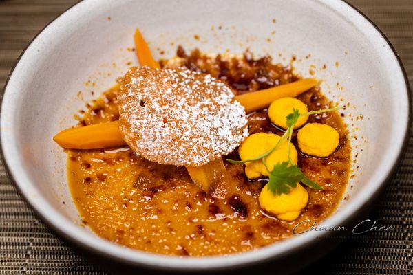 Butterscotch Creme Brulee, with carrot gel and brandy snap